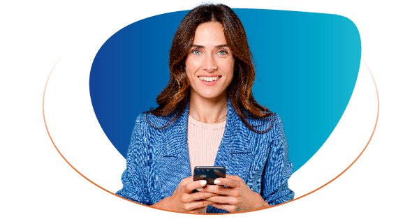 Smiling woman holding a mobile phone in both hands